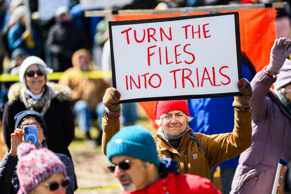 Protestor cites Epstein files at a No Kings anti-Trump demonstration at the Vermont State House in Montpelier, Vermont. (Photo by: John Lazenby/UCG/Universal Images Group via Getty Images)